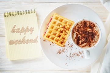 Sketchpad and a cup of hot cocoa