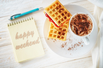 Sketchpad and a cup of hot cocoa