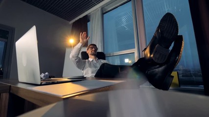 A tired businessman throws paper balls.  - Powered by Adobe