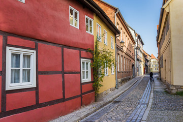 Fototapeta na wymiar Colorful cobblestoned street in the old center of Quedlinburg
