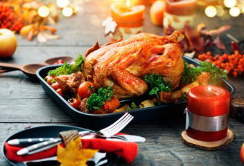 Thanksgiving holiday dinner. Served table with roasted turkey