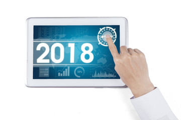 Businessman hand touching a start button