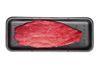 Fresh raw beef steak in black plastic container