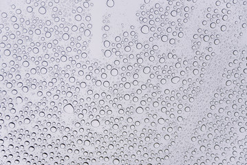 Glass surface with lot of water drops. Background.