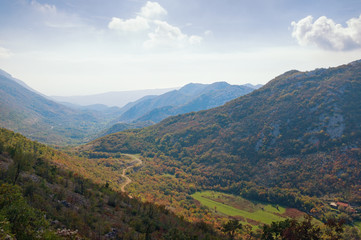 Naklejka premium Beautiful mountain landscape with small village and road. Bosnia and Herzegovina