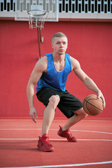 man on the street plays basketball