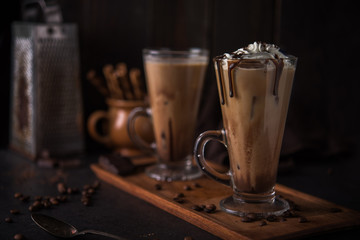 Iced coffee on wooden background