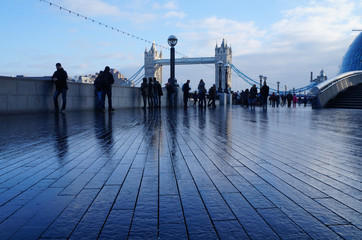 River embankment in London with Tower Bridge on the background