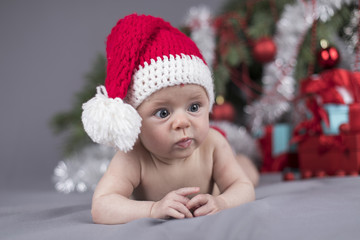 Little cute baby girl with santa hat