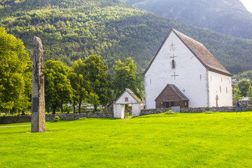 Antique traditional norwegian church. Kinsarvik village. Visit Norway.