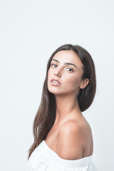Obraz premium white Caucasian brunette girl female model attractive fit skinny sexy beautiful posing on studio white background portrait white shirt