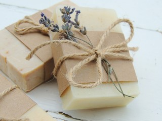 Handmade spa lavender soap on vintage wooden background. Soap making. Soap bars. Spa, skin care. - obrazy, fototapety, plakaty