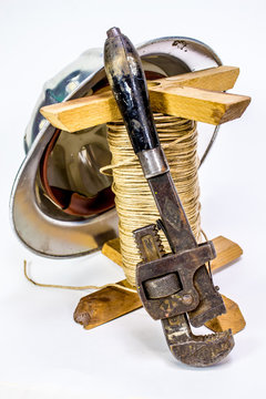 Pipe Wrench and Hard Hat