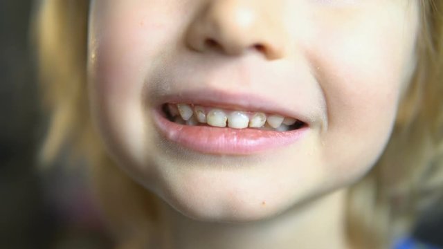 teeth with a touch. super slow shooting.