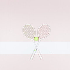 tennis balls on rackets