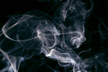 Smoke abstract as wallpaper / Smoke is a collection of airborne solid and liquid particulates and gases emitted when a material undergoes combustion