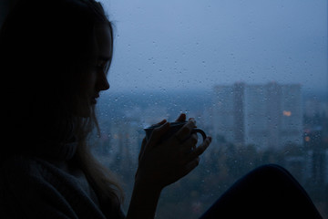 Silhouette of a young beautiful girl