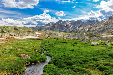 Fototapeta na wymiar Rocky Mountain Landscape with Lakes and Waterfalls