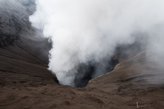 Volcanic eruption, close up on crater with smoke, Mount Bromo, Indonesia