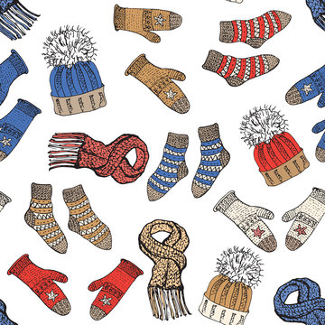 Winter season doodle clothes seamless pattern. Hand drawn sketch elements warm raindeer sweater socks, gloves and hats. vector background illustration.