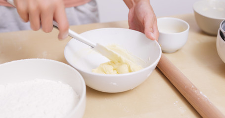 Obraz na płótnie Canvas Mixing dough by hand