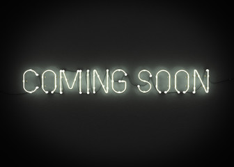 COMING SOON neon sign on dark background. 3D illustration