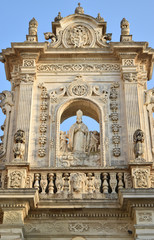 Fototapeta na wymiar Baroque triumph/ The upper part of the cathedral's facade