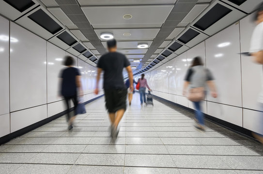 passenger walking in subway