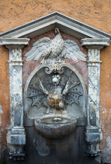 A drinking fountain in Rome .