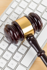 Wooden judge gavel and soundboard with keyboard