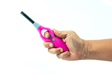 pink lighter in hand on white background isolate