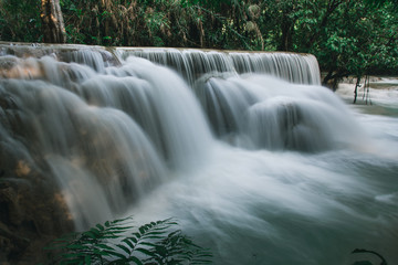 Fototapeta na wymiar Waterfall Flowing after Rainy Season near Luang Prabang, Laos // Kuang Si Falls Trail