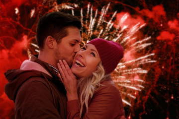 Happy Couple in Love Celebrating Christmas With Amazing Fireworks