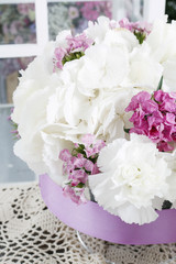 Wedding decoration with white carnations and hortensia flowers.