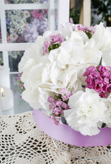Wedding decoration with white carnations and hortensia flowers.