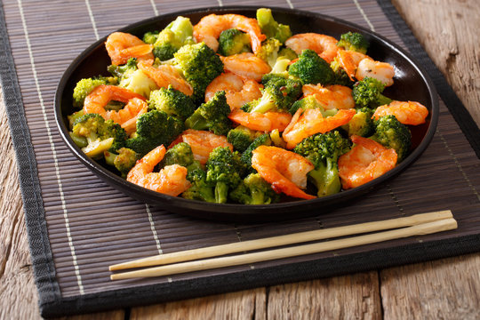 Stir fry with shrimp,  broccoli and garlic  - Chinese food. closeup. Horizontal