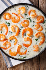 creamy garlic butter tuscan shrimp with spinach macro. Vertical top view