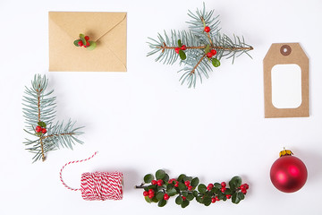 Christmas gift  box collection with envelope, ribbon, red berries for mock up template design. View from above. Flat lay, copy space.