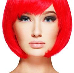 Closeup face of a beautiful  girl with  red hair