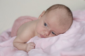 Cute happy baby girl crawling 