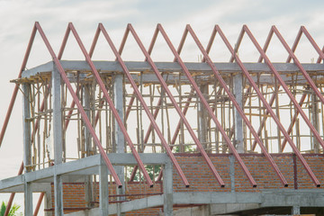 Structural steel roof using steel frames of building residential construction.