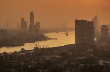 Bangkok river side cityscape. Bangkok night view in the business district. at twilight.Panorama view of Bangkok cityscape at night time. vintage colour tone 