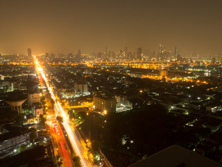 Fototapeta na wymiar Bangkok river side cityscape. Bangkok night view in the business district. at twilight.Panorama view of Bangkok cityscape at night time. vintage colour tone 