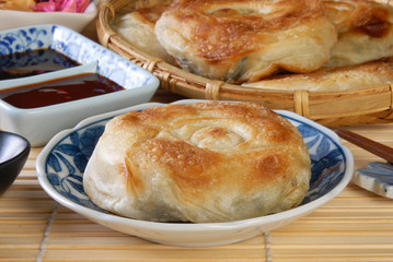 Green onion pancakes are a fried Chinese flatbread often eaten as a snack or with a meal. 