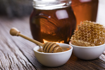Fresh honey on wooden table