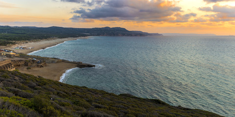 Funtanamare beach at sunset, on west coast of Sardinia, Iglesias, Italy