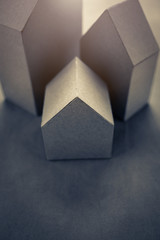 house concept with house paper model on texture background
