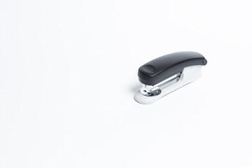 Black and white isolated metal stapler isolated background