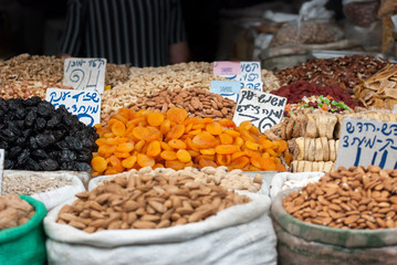 Assorted dried fruits and nuts for sale at Mahane Yehuda Market, popular marketplace in Jerusalem, Israel