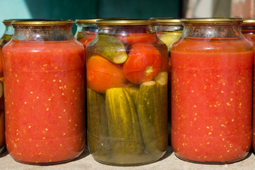 Jars with variety of pickled vegetables. Preservation